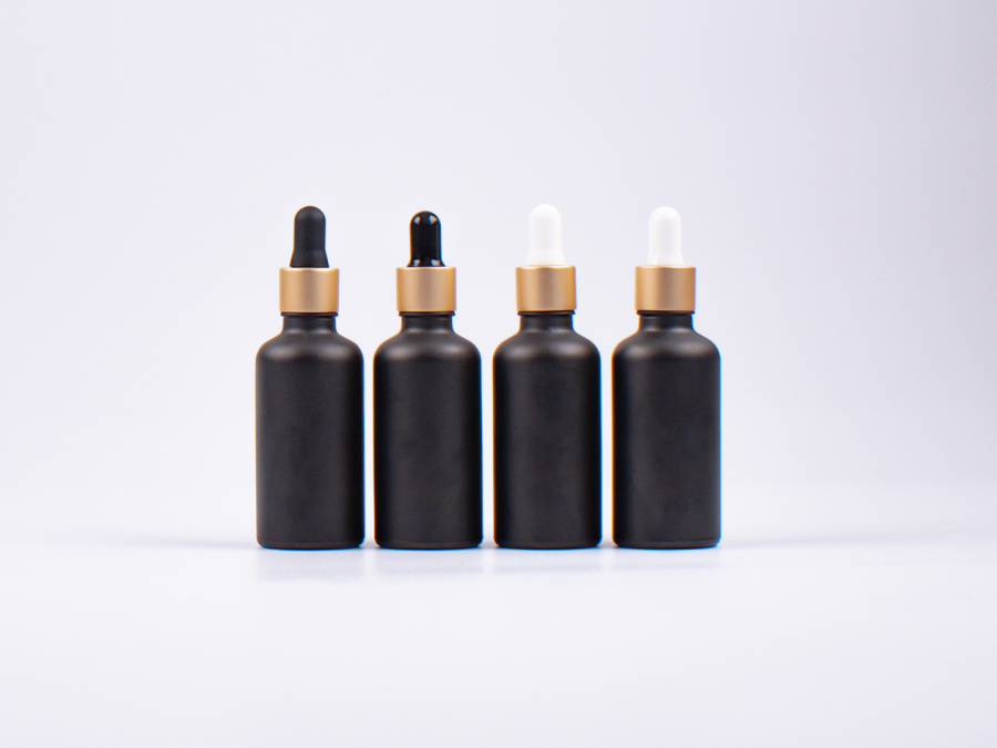 Schwarzglasflasche 10ml, mit Pipette gold